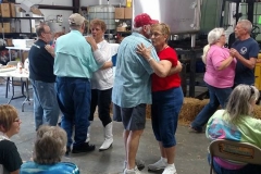 Couples dancing at open house event