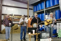 Tom White performing at the Distillery