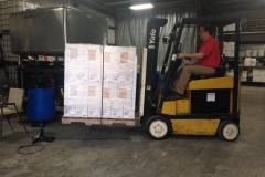 Loading the first pallet to ship.